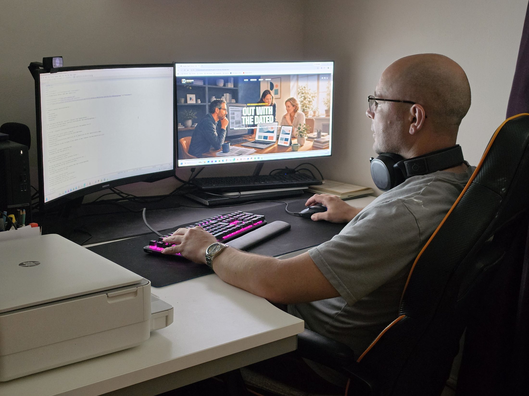 Liam working at his desk on a client site redesign